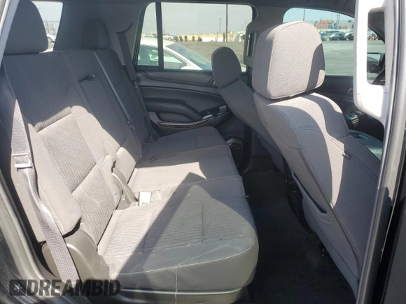 2018 Chevrolet Tahoe LS with VIN 1GNSCAKC9JR201994, listed as a Copart auction lot 53100735 with 182,460 mi miles and Salvage title. Bid and sale history available at DreamBid. Image 11.