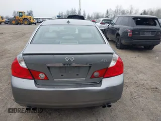 2007 Infiniti M Sport z VIN JNKAY01EX7M302565, wystawiony jako IAAI lot #41885272 z przebiegiem 151 745 mil mil oraz . Historia ofert i sprzedaży dostępna na DreamBid. Obrazek 16.