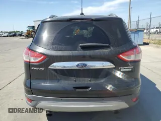 2015 Ford Escape Titanium with VIN 1FMCU0J97FUC80446, listed as a Copart auction lot 58749895 with 106,890 mi miles and Salvage title. Bid and sale history available at DreamBid. Image 6.