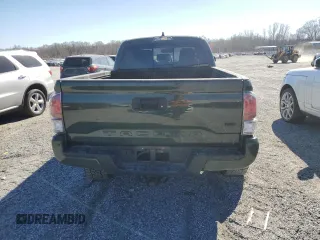2021 Toyota Tacoma 4WD SR5 with VIN 3TMDZ5BN3MM111433, listed as a Copart auction lot 47736135 with 73,061 mi miles and Salvage Title. Bid and sale history available at carsss.com. Image 6.