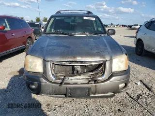 2006 GMC Envoy SLE with VIN 1GKET16S766147308, listed as a Copart auction lot 71669374 with 237,254 mi miles and Salvage Title. Bid and sale history available at DreamBid. Image 5.