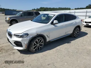 2020 BMW X4 xDrive30i with VIN 5UX2V1C08L9B03549, listed as a Copart auction lot 59237075 with 63,310 mi miles and Salvage title. Bid and sale history available at DreamBid. Image 1.