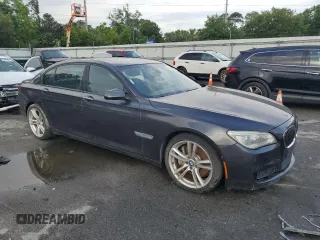 2014 BMW 7 Series ALPINA B7 with VIN WBAYE8C59ED134867, listed as a Copart auction lot 54244305 with 111,565 mi miles and Clean title. Bid and sale history available at DreamBid. Image 4.