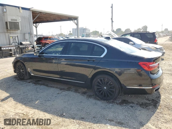 2016 BMW 7 Series 740i z VIN WBA7E2C58GG738940, wystawiony jako Copart lot #60503595 z przebiegiem 99 654 mil mil oraz Szkoda całkowita • Salvage title. Historia ofert i sprzedaży dostępna na DreamBid. Obrazek 2.