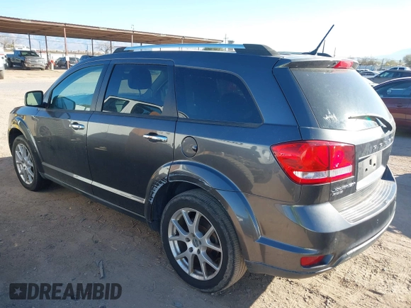 2014 Dodge Journey Limited with VIN 3C4PDDDG2ET175023, listed as a IAAI auction lot 41646669 with 112,663 mi miles and . Bid and sale history available at carsss.com. Image 3.