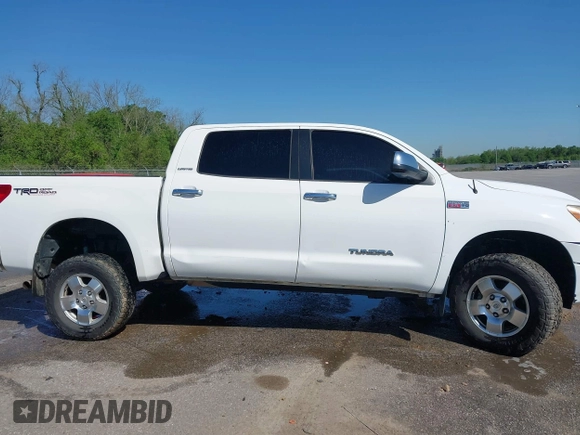 2012 Toyota Tundra 4WD Truck LTD with VIN 5TFHW5F1XCX269682, listed as a IAAI auction lot 41968019 with 166,074 mi miles. Bid and sale history available at carsss.com. Image 14.