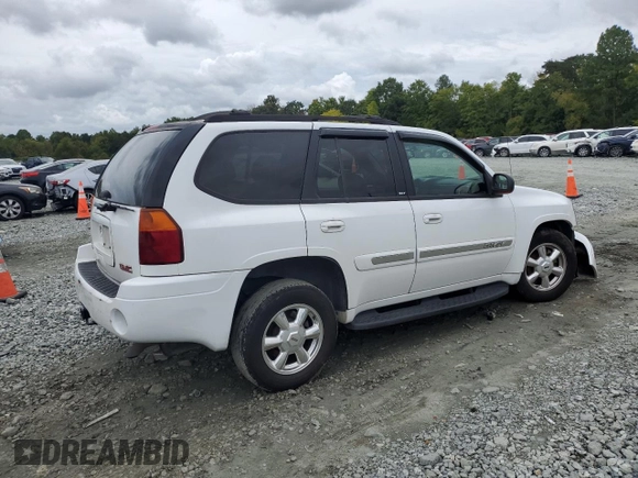 2005 GMC Envoy SLT with VIN 1GKDS13S652330496, listed as a Copart auction lot 73317234 with 191,138 mi miles and Salvage Title. Bid and sale history available at DreamBid. Image 3.
