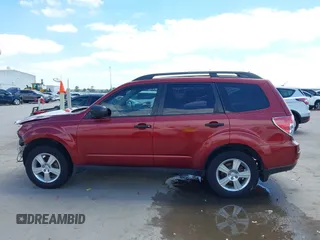 2012 Subaru Forester X with VIN JF2SHBBC5CH430957, listed as a IAAI auction lot 42020033 with 90,216 mi miles and . Bid and sale history available at DreamBid. Image 15.