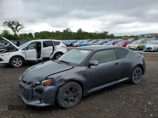 2016 Scion tC z VIN JTKJF5C75GJ021562, wystawiony jako Copart lot #57845145 z przebiegiem 112 031 mil mil oraz Szkoda całkowita • Salvage title. Historia ofert i sprzedaży dostępna na DreamBid. Obrazek 1.