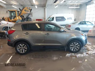 2015 Kia Sportage LX with VIN KNDPB3ACXF7686082, listed as a IAAI auction lot 41282616 with 107,613 mi miles and . Bid and sale history available at carsss.com. Image 13.