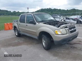 2005 Ford Explorer Sport Trac XLS z VIN 1FMZU67K05UA12487, wystawiony jako IAAI lot #42371318 z przebiegiem Nie podano mil oraz . Historia ofert i sprzedaży dostępna na DreamBid. Obrazek 1.