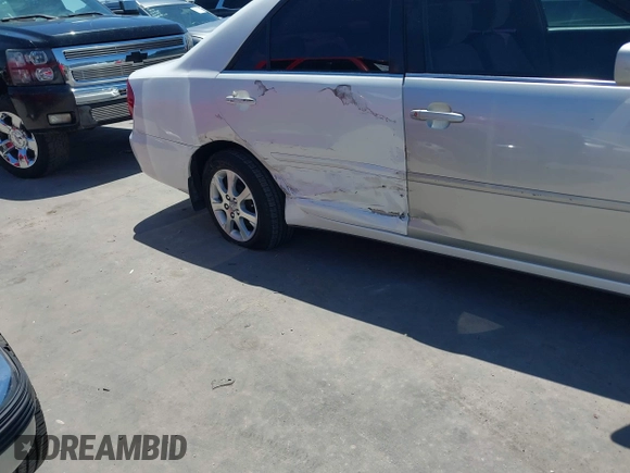 2004 Toyota Camry LE with VIN JTDBE32K840277463, listed as a IAAI auction lot 42080523 with 139,558 mi miles. Bid and sale history available at carsss.com. Image 6.
