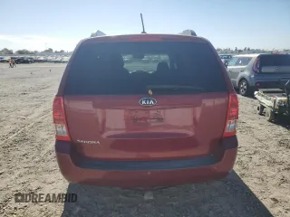 2012 Kia Sedona LX with VIN KNDMG4C79C6483194, listed as a Copart auction lot 77485374 with 110,831 mi miles and Salvage Title. Bid and sale history available at carsss.com. Image 6.