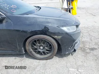 2021 Honda Civic Sport with VIN 2HGFC2F88MH557221, listed as a IAAI auction lot 42161778 with 101,956 mi miles and . Bid and sale history available at DreamBid. Image 19.