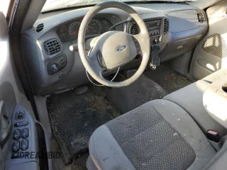 2003 Ford F-150 XLT with VIN 1FTRW08623KD45425, listed as a Copart auction lot 77605404 with 174,369 mi miles and Salvage Title. Bid and sale history available at carsss.com. Image 8.