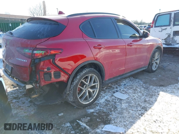 2019 Alfa Romeo Stelvio z VIN ZASPAKAN9K7C49108, wystawiony jako IAAI lot #41365234 z przebiegiem 53 196 mil mil oraz . Historia ofert i sprzedaży dostępna na DreamBid. Obrazek 4.