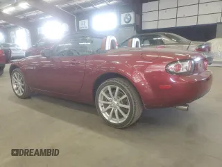 2006 Mazda MX-5 Miata Grand Touring with VIN JM1NC25F760121395, listed as a Copart auction lot 59712275 with 45,498 mi miles and Salvage title. Bid and sale history available at DreamBid. Image 2.
