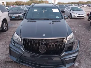 2014 Mercedes-Benz GL-Class GL 550 with VIN 4JGDF7DE9EA329761, listed as a IAAI auction lot 41651533 with 113,056 mi miles. Bid and sale history available at carsss.com. Image 12.