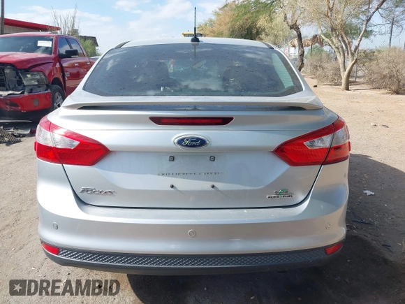 2013 Ford Focus SE with VIN 1FADP3F21DL184625, listed as a IAAI auction lot 42575194 with 113,601 mi miles and . Bid and sale history available at DreamBid. Image 17.
