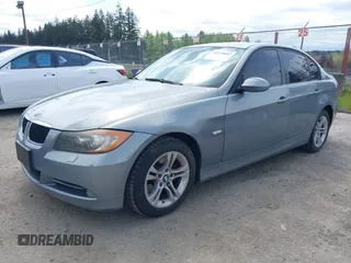 2008 BMW 3 Series 328i with VIN WBAVC53518F008938, listed as a IAAI auction lot 42150683 with 129,989 mi miles. Bid and sale history available at carsss.com. Image 2.