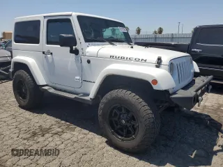 2015 Jeep Wrangler Rubicon Hard Rock z VIN 1C4BJWCG5FL561397, wystawiony jako Copart lot #61218185 z przebiegiem 164 240 mil mil oraz Czysty tytuł • Clean title. Historia ofert i sprzedaży dostępna na DreamBid. Obrazek 4.