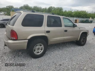 2003 Dodge Durango SLT z VIN 1D4HS48N63F523970, wystawiony jako Copart lot #57568385 z przebiegiem 296 806 mil mil oraz Czysty tytuł • Clean title. Historia ofert i sprzedaży dostępna na DreamBid. Obrazek 3.