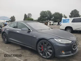 2014 Tesla Model S 60 with VIN 5YJSA1H10EFP60690, listed as a Copart auction lot 62515065 with 57,864 mi miles and Clean title. Bid and sale history available at DreamBid. Image 4.