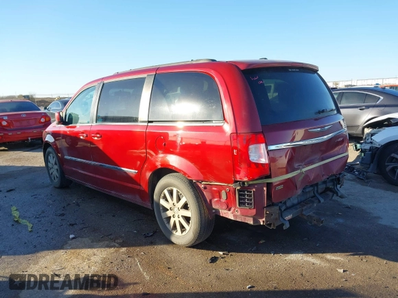 2013 Chrysler Town & Country Touring with VIN 2C4RC1BG2DR758951, listed as a IAAI auction lot 41136184 with 134,784 mi miles. Bid and sale history available at carsss.com. Image 3.