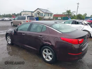 2014 Kia Optima LX z VIN 5XXGM4A73EG270576, wystawiony jako IAAI lot #42335343 z przebiegiem 207 000 mil mil oraz . Historia ofert i sprzedaży dostępna na DreamBid. Obrazek 3.