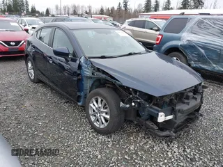 2016 Mazda 3 i Grand Touring with VIN JM1BM1N73G1337274, listed as a IAAI auction lot 41851662 with 44,160 mi miles and . Bid and sale history available at DreamBid. Image 1.