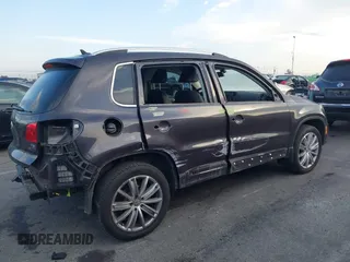2016 Volkswagen Tiguan S with VIN WVGBV7AX5GW568438, listed as a IAAI auction lot 41434616 with 91,341 mi miles and . Bid and sale history available at DreamBid. Image 14.