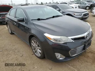 2014 Toyota Avalon Limited z VIN 4T1BK1EB0EU093391, wystawiony jako Copart lot #60319325 z przebiegiem 231 666 mil mil oraz Czysty tytuł • Clean title. Historia ofert i sprzedaży dostępna na DreamBid. Obrazek 4.