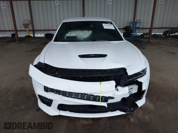 2023 Dodge Charger Scat Pack Widebody with VIN 2C3CDXGJ9PH516473, listed as a IAAI auction lot 41188167 with 38,021 mi miles and . Bid and sale history available at DreamBid. Image 12.