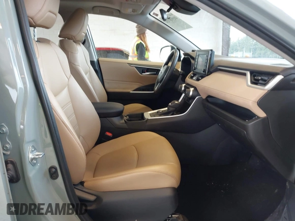 2021 Toyota RAV4 Hybrid LE with VIN 4T3B6RFV3MU010280, listed as a IAAI auction lot 41518724 with 48,916 mi miles. Bid and sale history available at carsss.com. Image 5.
