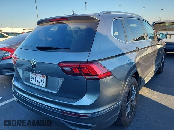 2024 Volkswagen Tiguan SE with VIN 3VV3B7AX5RM107598, listed as a IAAI auction lot 42796418 with 25,762 mi miles and . Bid and sale history available at DreamBid. Image 7.