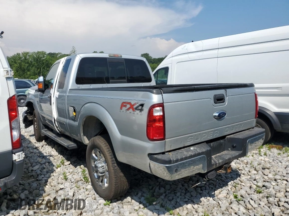 2014 Ford F-250 XL with VIN 1FT7X2B67EEA13796, listed as a Copart auction lot 61712565 with 130,090 mi miles and Salvage title. Bid and sale history available at DreamBid. Image 2.