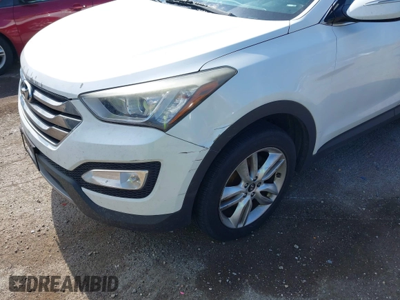 2013 Hyundai Santa Fe Sport z VIN 5XYZU3LA5DG045646, wystawiony jako IAAI lot #42380560 z przebiegiem 131 944 mil mil oraz . Historia ofert i sprzedaży dostępna na DreamBid. Obrazek 6.