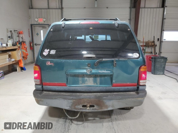 1998 Mercury Mountaineer z VIN 4M2ZU55PXWUJ01704, wystawiony jako Copart lot #50892605 z przebiegiem 196 987 mil mil oraz Szkoda całkowita • Salvage title. Historia ofert i sprzedaży dostępna na DreamBid. Obrazek 6.