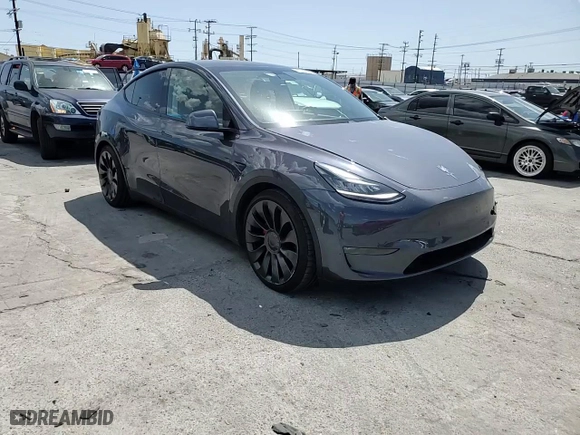 2020 Tesla Model Y Long Range with VIN 5YJYGDEFXLF022578, listed as a Copart auction lot 51849705 with 33,943 mi miles and Salvage Title. Bid and sale history available at carsss.com. Image 12.