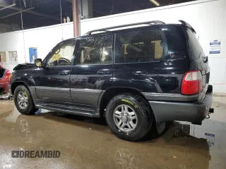 2002 Lexus LX 470 z VIN JTJHT00W023515545, wystawiony jako Copart lot #79218054 z przebiegiem 310 334 mil mil oraz Szkoda całkowita • Salvage title. Historia ofert i sprzedaży dostępna na DreamBid. Obrazek 2.