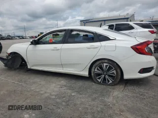 2016 Honda Civic EX-L с VIN 2HGFC1F74GH650713, выставлен на аукционе Copart как лот 58959515 с пробегом Не указан миль и Списание • Salvage title. История ставок и продаж доступна на DreamBid. Изображение 2.