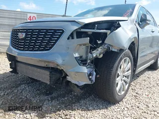 2023 Cadillac XT4 FWD Premium Luxury with VIN 1GYFZCR45PF199216, listed as a IAAI auction lot 42762273 with 54,808 mi miles and . Bid and sale history available at DreamBid. Image 6.