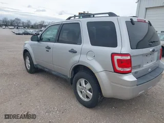 2011 Ford Escape XLT with VIN 1FMCU9D72BKB26439, listed as a IAAI auction lot 41914514 with 242,172 mi miles. Bid and sale history available at carsss.com. Image 3.