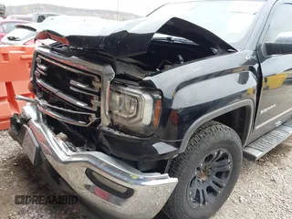 2017 GMC Sierra 1500 SLT z VIN 3GTU2NEC7HG231965, wystawiony jako IAAI lot #41154618 z przebiegiem 93 076 mil mil oraz . Historia ofert i sprzedaży dostępna na DreamBid. Obrazek 6.