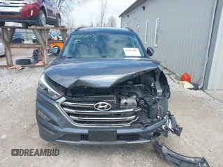 2016 Hyundai Tucson Eco with VIN KM8J3CA2XGU103017, listed as a IAAI auction lot 41897807 with 95,722 mi miles. Bid and sale history available at carsss.com. Image 12.
