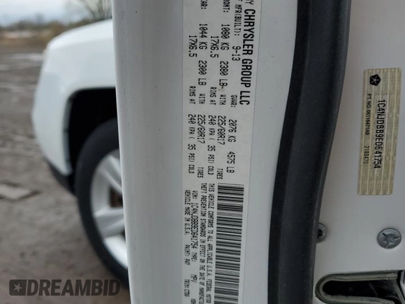 2014 Jeep Compass Sport with VIN 1C4NJDBB9ED641754, listed as a Copart auction lot 52806165 with 76,100 mi miles and Clean Title. Bid and sale history available at carsss.com. Image 13.