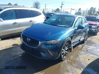 2018 Mazda CX-3 Touring z VIN JM1DKFC73J0301449, wystawiony jako IAAI lot #41678604 z przebiegiem 105 249 mil mil oraz . Historia ofert i sprzedaży dostępna na DreamBid. Obrazek 2.