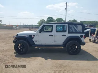 2018 Jeep Wrangler Unlimited Sport S with VIN 1C4HJXDG7JW150038, listed as a IAAI auction lot 42519194 with 113,300 mi miles and . Bid and sale history available at DreamBid. Image 14.