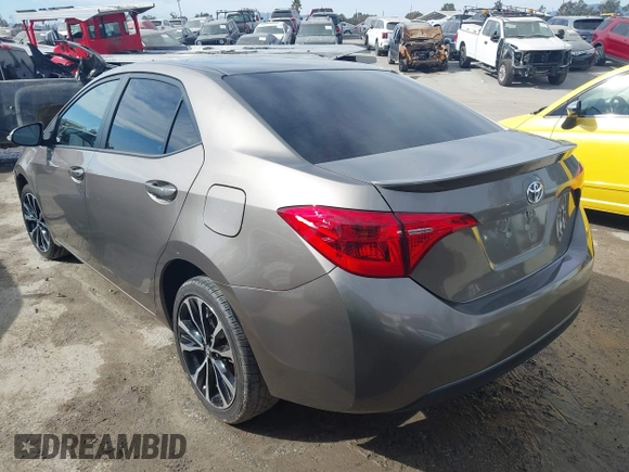 2017 Toyota Corolla L z VIN 5YFBURHE5HP730912, wystawiony jako IAAI lot #41610019 z przebiegiem 61 440 mil mil oraz . Historia ofert i sprzedaży dostępna na DreamBid. Obrazek 3.