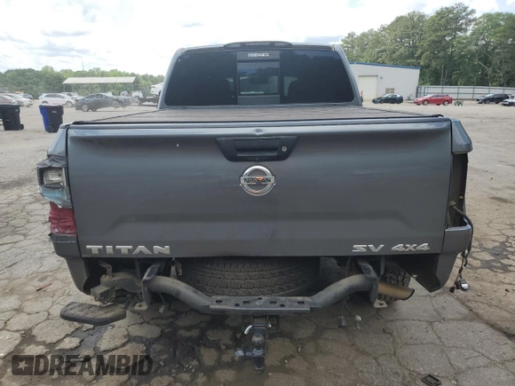 2017 Nissan Titan Platinum Reserve z VIN 1N6AA1E56HN571502, wystawiony jako Copart lot #56751155 z przebiegiem 105 017 mil mil oraz Szkoda całkowita • Salvage title. Historia ofert i sprzedaży dostępna na DreamBid. Obrazek 6.
